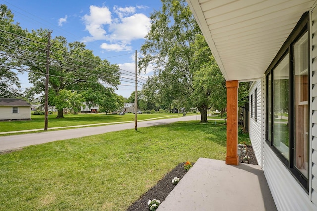 1358 Moler Rd, Columbus, OH 43207 - view of green lawn featuring a patio area