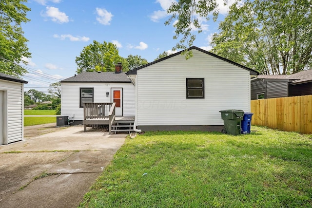 1358 Moler Rd, Columbus, OH 43207 - back of property with a deck and a patio area