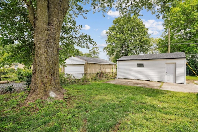1358 Moler Rd, Columbus, OH 43207 - view of yard featuring an outdoor structure and a patio area