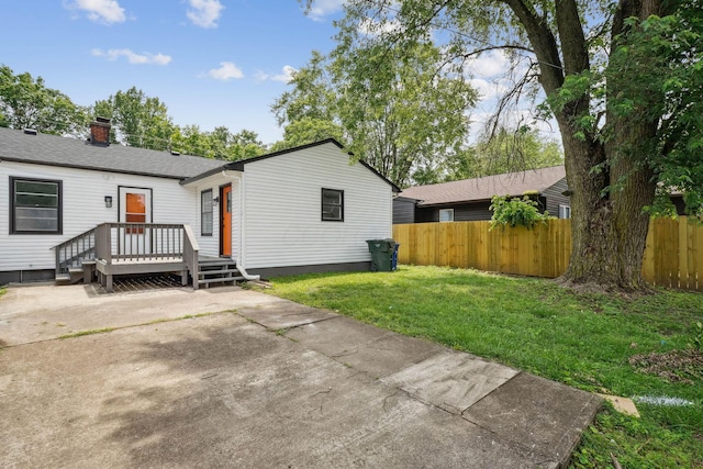 1358 Moler Rd, Columbus, OH 43207 - view of front of home featuring a deck and a chimney