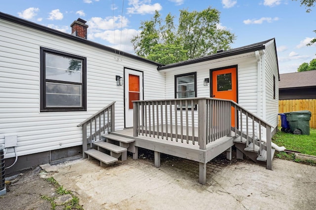 1358 Moler Rd, Columbus, OH 43207 - view of front of property with a chimney and a wooden deck