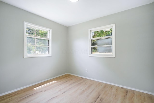 1358 Moler Rd, Columbus, OH 43207 - unfurnished room featuring plenty of natural light and light wood-type flooring
