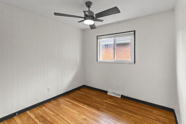 1861 Berkeley Rd, Columbus, OH 43207 - spare room featuring light wood-type flooring and ceiling fan