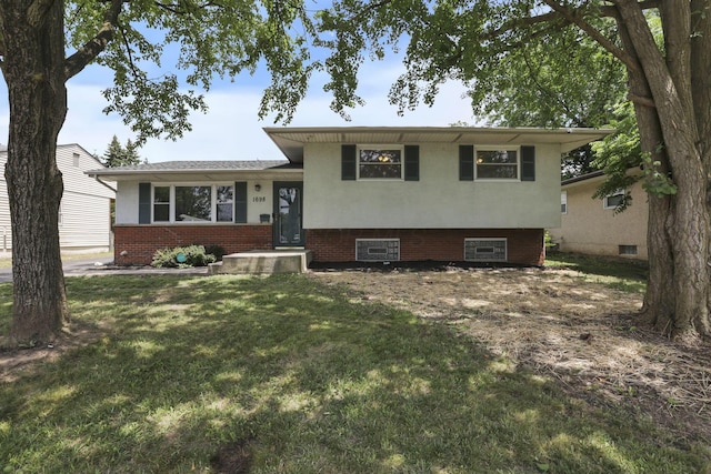 1698 Woodcrest Rd, Columbus, OH 43232 - split level home with a front lawn, crawl space, and brick siding