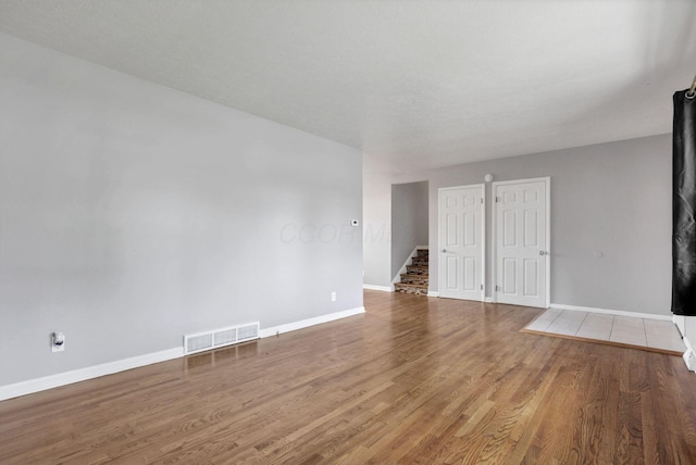 1698 Woodcrest Rd, Columbus, OH 43232 - spare room with baseboards and wood finished floors