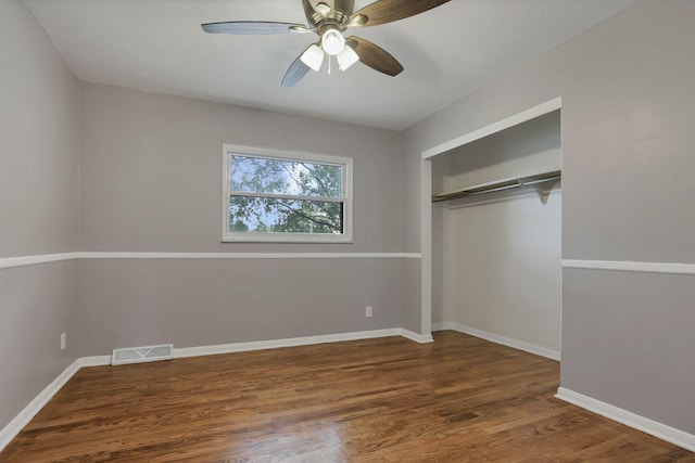1698 Woodcrest Rd, Columbus, OH 43232 - unfurnished bedroom with wood finished floors, a closet, and ceiling fan