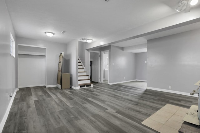 1698 Woodcrest Rd, Columbus, OH 43232 - finished below grade area featuring dark wood finished floors and stairs