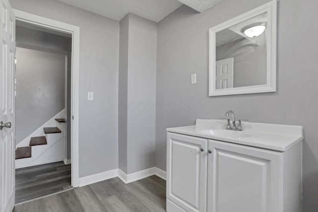1698 Woodcrest Rd, Columbus, OH 43232 - bathroom with wood finished floors and vanity