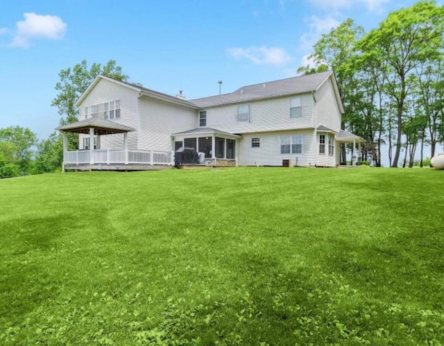 6171 State Route 245, North Lewisburg, OH 43060 - rear view of property with a sunroom, a gazebo, and a lawn