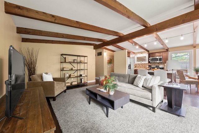 2474 Bristol Rd, Columbus, OH 43221 - living area with beam ceiling and wood finished floors