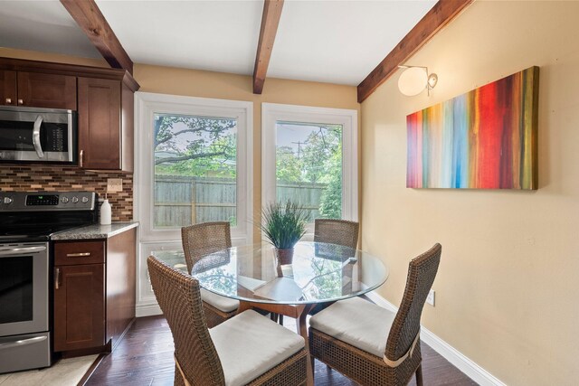 2474 Bristol Rd, Columbus, OH 43221 - dining space with beamed ceiling, healthy amount of natural light, and wood finished floors