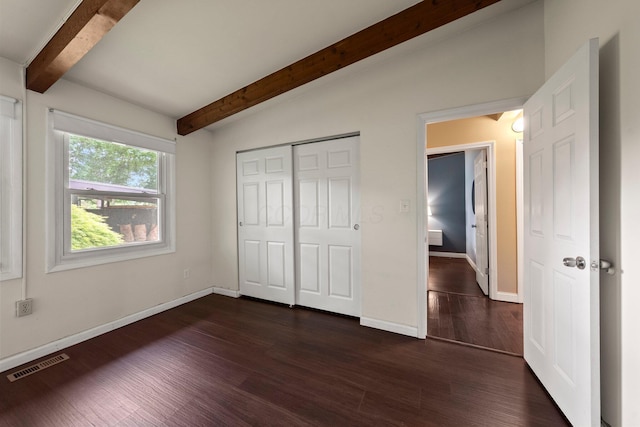 2474 Bristol Rd, Columbus, OH 43221 - unfurnished bedroom featuring beam ceiling, dark wood-style floors, and a closet