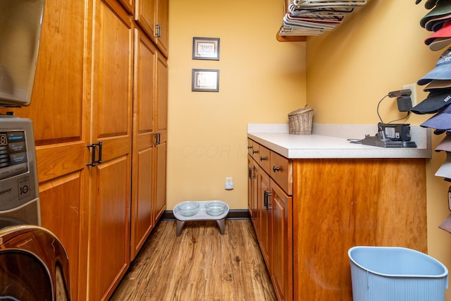 1163 Sitterley Rd NW, Canal Winchester, OH 43110 - washroom with cabinet space and light wood-type flooring