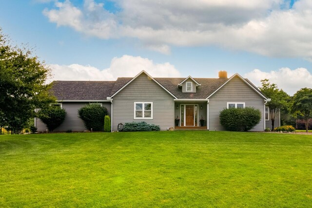 1163 Sitterley Rd NW, Canal Winchester, OH 43110 - view of front of property with a chimney, a front lawn, and a shingled roof