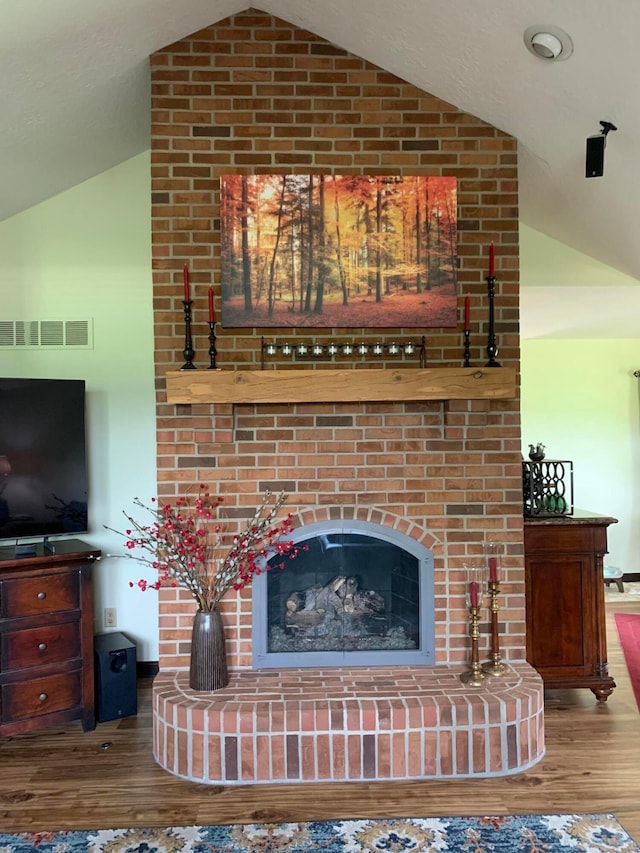 1163 Sitterley Rd NW, Canal Winchester, OH 43110 - living room with vaulted ceiling and wood finished floors