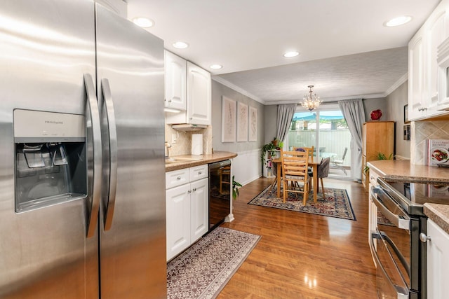 5092 Schuylkill St Unit 31-92, Columbus, OH 43220 - kitchen featuring appliances with stainless steel finishes, wine cooler, crown molding, white cabinets, and light wood-type flooring