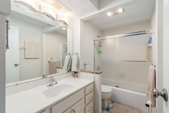 5092 Schuylkill St Unit 31-92, Columbus, OH 43220 - bathroom featuring vanity, tile patterned flooring, and shower / bath combination with glass door