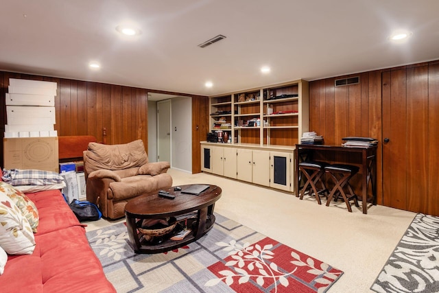 5092 Schuylkill St Unit 31-92, Columbus, OH 43220 - living room with wooden walls, light carpet, and recessed lighting