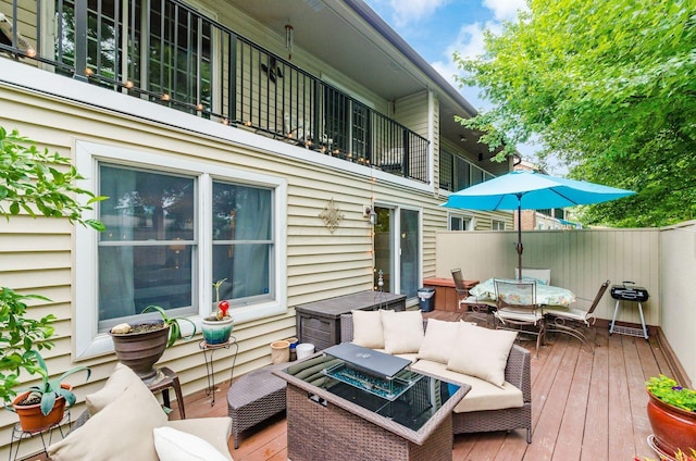 5092 Schuylkill St Unit 31-92, Columbus, OH 43220 - wooden deck with outdoor dining space and an outdoor living space with a fire pit