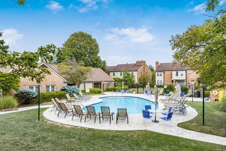 5092 Schuylkill St Unit 31-92, Columbus, OH 43220 - community pool with a lawn, a residential view, and a patio