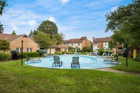 5092 Schuylkill St Unit 31-92, Columbus, OH 43220 - community pool featuring a lawn, a residential view, and a patio