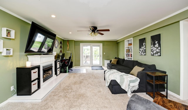 175 Pierson Blvd, Newark, OH 43055 - living area with carpet floors, a ceiling fan, crown molding, recessed lighting, and a fireplace with raised hearth