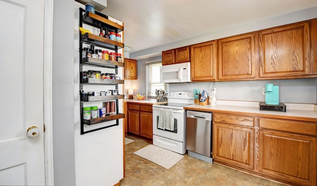 175 Pierson Blvd, Newark, OH 43055 - kitchen with white appliances, light countertops, brown cabinetry, and open shelves