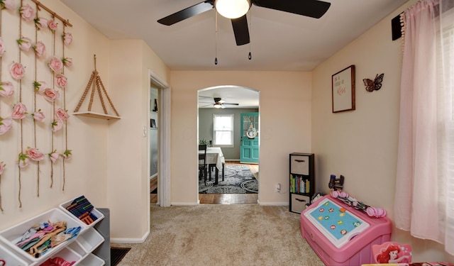 175 Pierson Blvd, Newark, OH 43055 - playroom with ceiling fan, carpet flooring, and arched walkways