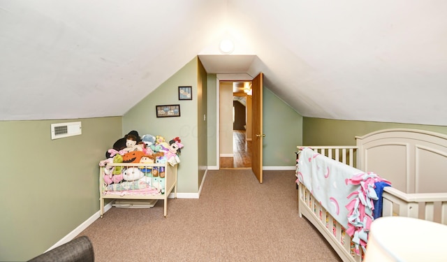175 Pierson Blvd, Newark, OH 43055 - bedroom with light carpet, lofted ceiling, and a crib