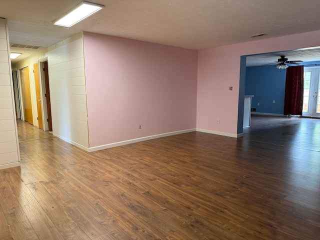 1628 Lucks Rd, Reynoldsburg, OH 43068 - empty room featuring dark wood finished floors, ceiling fan, and a textured ceiling