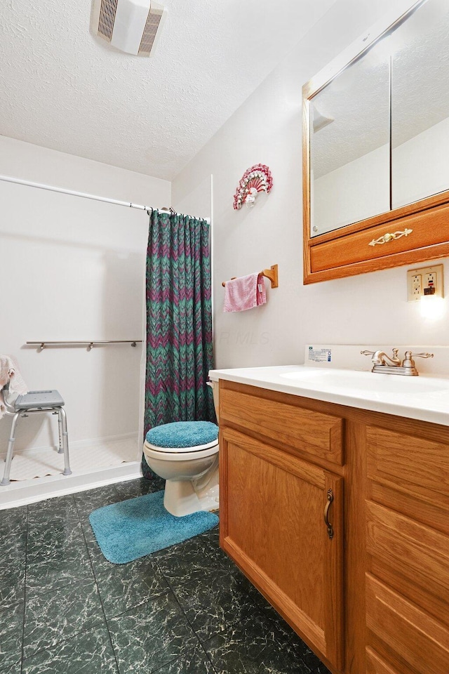 1138 Ohio Ave, Logan, OH 43138 - bathroom with vanity, a shower with curtain, and a textured ceiling