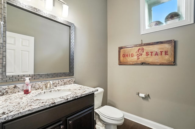 3860 Coldwater Loop, Powell, OH 43065 - half bathroom featuring vanity and wood finished floors
