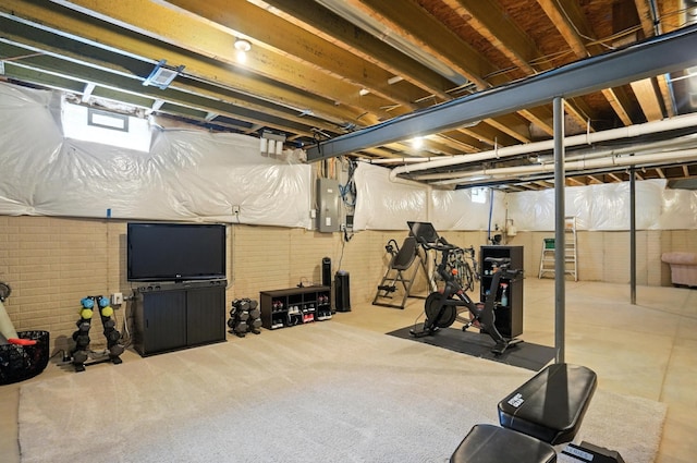 3860 Coldwater Loop, Powell, OH 43065 - workout room featuring electric panel and brick wall
