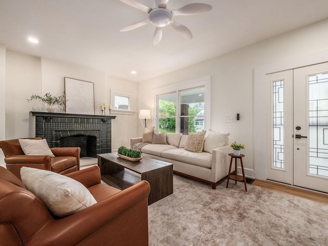 935 S Ohio Ave, Columbus, OH 43206 - living area featuring a brick fireplace, a ceiling fan, light wood-type flooring, and recessed lighting