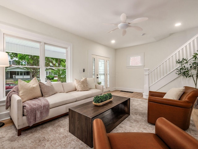935 S Ohio Ave, Columbus, OH 43206 - living room with stairway, ceiling fan, light wood-style flooring, and recessed lighting