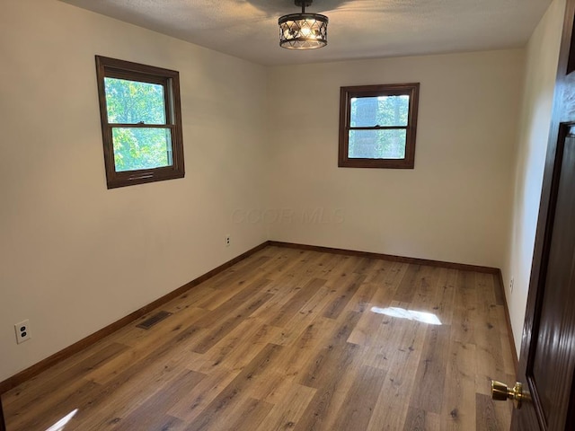 300 Core Rd, Frankfort, OH 45628 - spare room with baseboards and wood finished floors