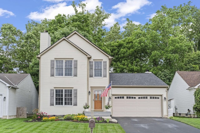 5528 Westerville Crossing Dr, Westerville, OH 43081 - traditional-style home with driveway, a chimney, an attached garage, and a front yard