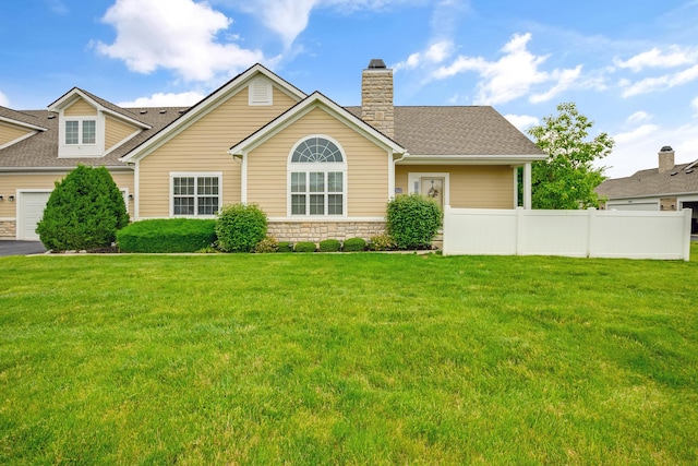 3242 Rossmore Cir, Powell, OH 43065 - view of front of home featuring stone siding, a chimney, a shingled roof, and a garage