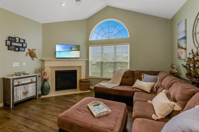 3242 Rossmore Cir, Powell, OH 43065 - living room with lofted ceiling, wood finished floors, and a tile fireplace