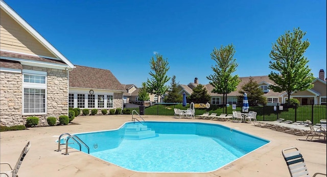 3242 Rossmore Cir, Powell, OH 43065 - community pool featuring a patio and a residential view
