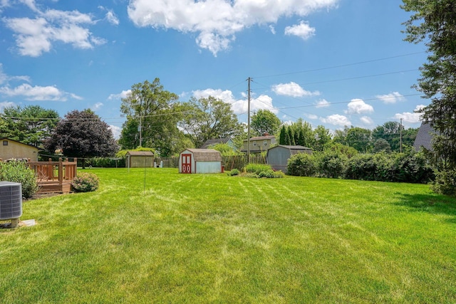 4979 Johnanne Dr, Groveport, OH 43125 - view of grassy yard featuring a shed and a wooden deck