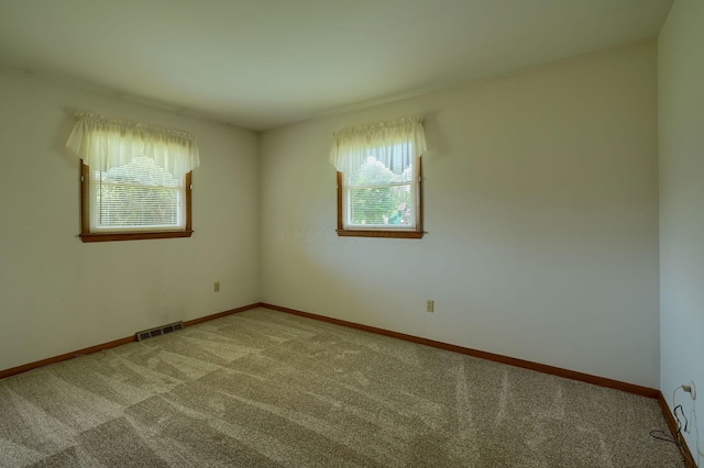 4979 Johnanne Dr, Groveport, OH 43125 - carpeted empty room featuring healthy amount of natural light