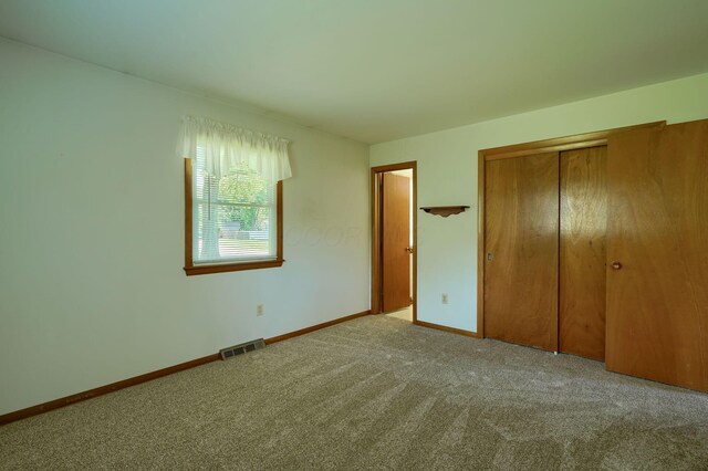 4979 Johnanne Dr, Groveport, OH 43125 - unfurnished bedroom featuring carpet and a closet