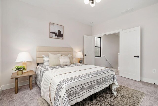 546 W Town St, Columbus, OH 43215 - bedroom with light colored carpet and baseboards