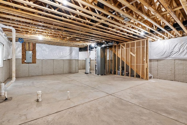 546 W Town St, Columbus, OH 43215 - unfinished basement with electric panel, water heater, and heating unit