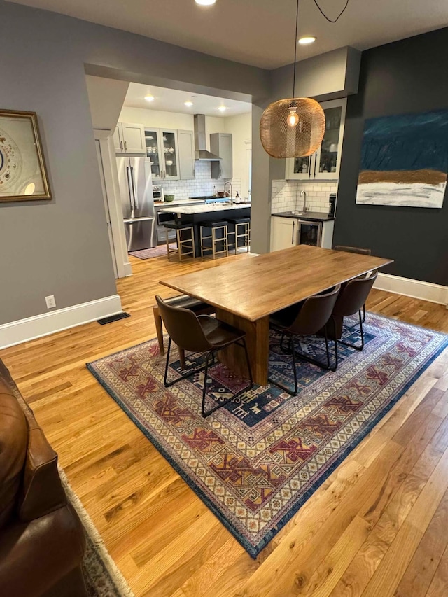 489 W 4th Ave, Columbus, OH 43201 - dining space featuring light wood-type flooring and recessed lighting