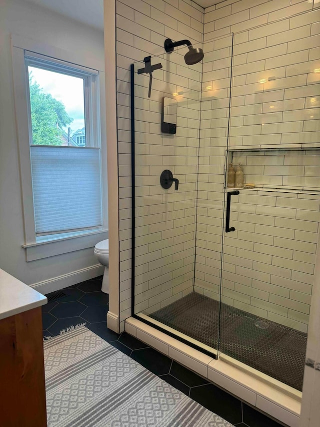 489 W 4th Ave, Columbus, OH 43201 - full bathroom featuring a stall shower, tile patterned floors, and vanity