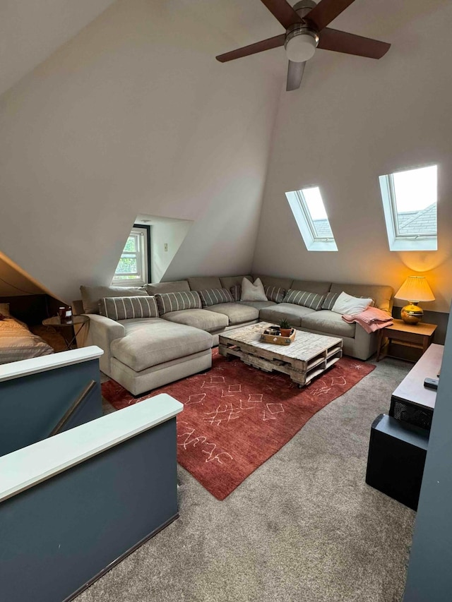489 W 4th Ave, Columbus, OH 43201 - living room featuring carpet flooring, a skylight, ceiling fan, and vaulted ceiling