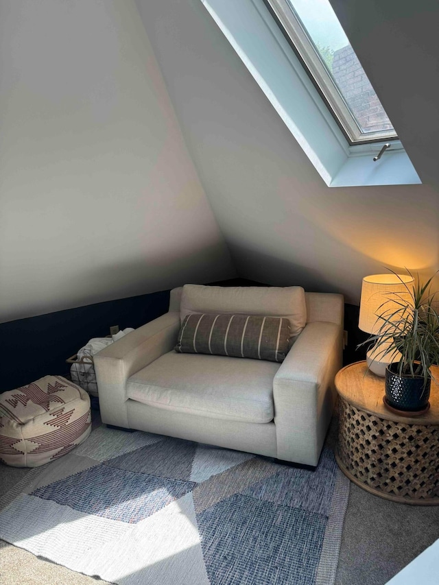 489 W 4th Ave, Columbus, OH 43201 - living area featuring a skylight, vaulted ceiling, and carpet