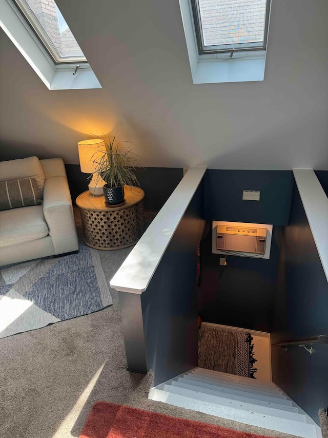489 W 4th Ave, Columbus, OH 43201 - staircase with a skylight, carpet flooring, and plenty of natural light